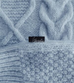 Women's sweater with high polo collar in blue